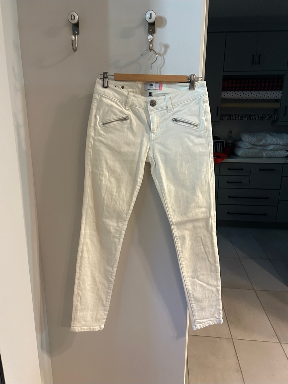 CAbi White Skinny Jeans with Front Zip Accents